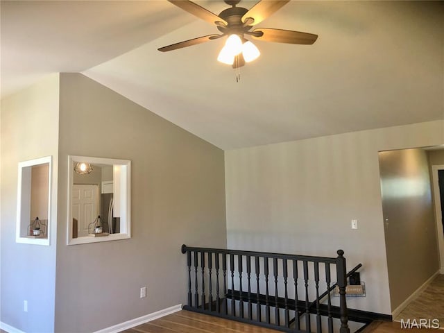 1215 Brookstone Ln, Lake St Louis, MO 63367 - stairs featuring baseboards, lofted ceiling, a ceiling fan, and wood finished floors