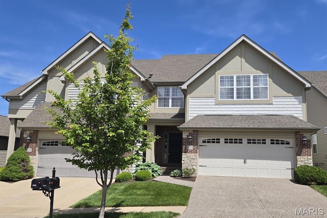 view of front of home with concrete driveway, a garage, roof with shingles, and stone siding