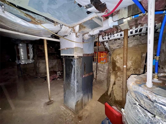 unfinished basement with heating unit