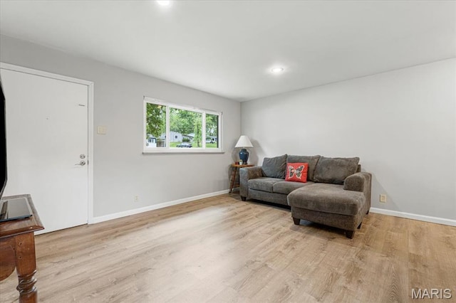 284 Ramsey Ln, Ballwin, MO 63021 - living room featuring light wood-type flooring, baseboards, and recessed lighting
