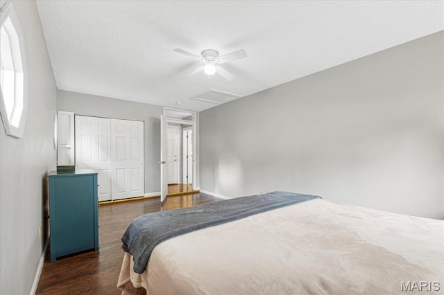 284 Ramsey Ln, Ballwin, MO 63021 - bedroom featuring baseboards, wood finished floors, attic access, a closet, and a ceiling fan