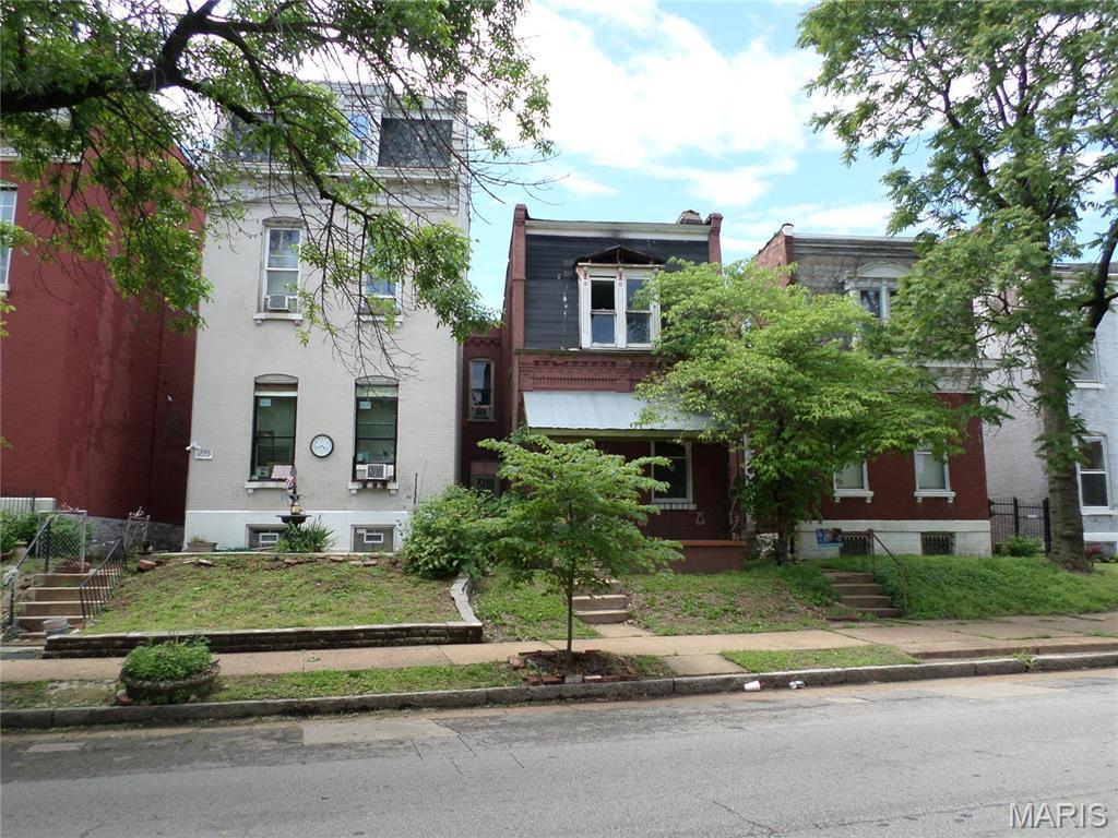 view of front facade with cooling unit