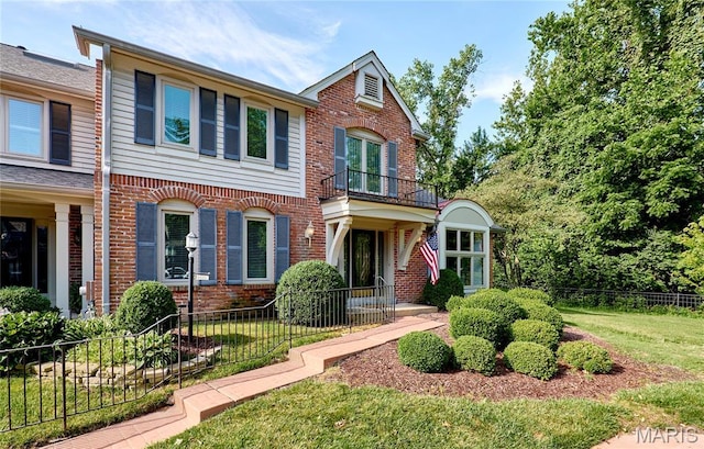 14424 Valley Meadow Ct W, Chesterfield, MO 63017 - view of front facade with a balcony and brick siding