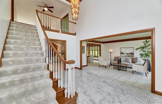 14424 Valley Meadow Ct W, Chesterfield, MO 63017 - stairway featuring carpet floors, a high ceiling, and ceiling fan