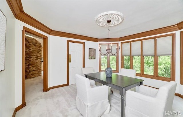14424 Valley Meadow Ct W, Chesterfield, MO 63017 - dining space featuring a chandelier, healthy amount of natural light, brick wall, light colored carpet, and crown molding
