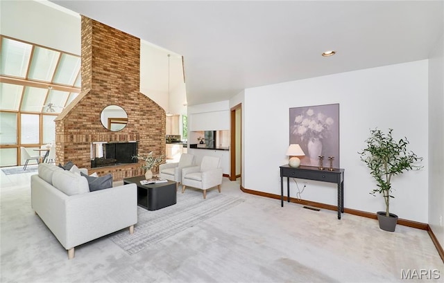 14424 Valley Meadow Ct W, Chesterfield, MO 63017 - living area with a brick fireplace, light colored carpet, and a high ceiling