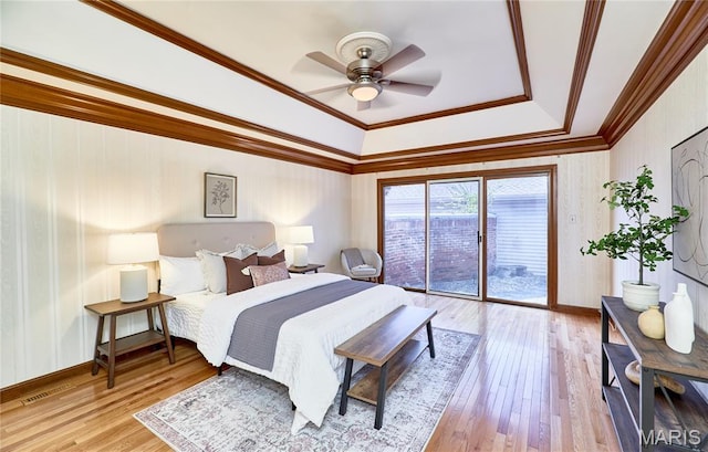 14424 Valley Meadow Ct W, Chesterfield, MO 63017 - bedroom with a raised ceiling, crown molding, access to outside, light wood-type flooring, and a ceiling fan