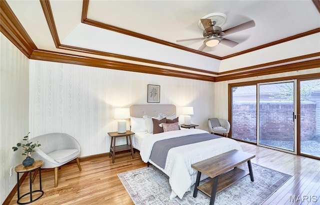 14424 Valley Meadow Ct W, Chesterfield, MO 63017 - bedroom featuring access to exterior, light wood finished floors, ornamental molding, a raised ceiling, and a ceiling fan