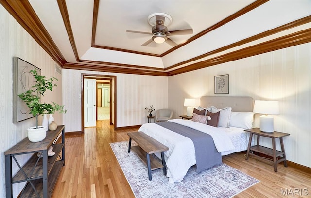 14424 Valley Meadow Ct W, Chesterfield, MO 63017 - bedroom with a raised ceiling, crown molding, light wood-style floors, and a ceiling fan