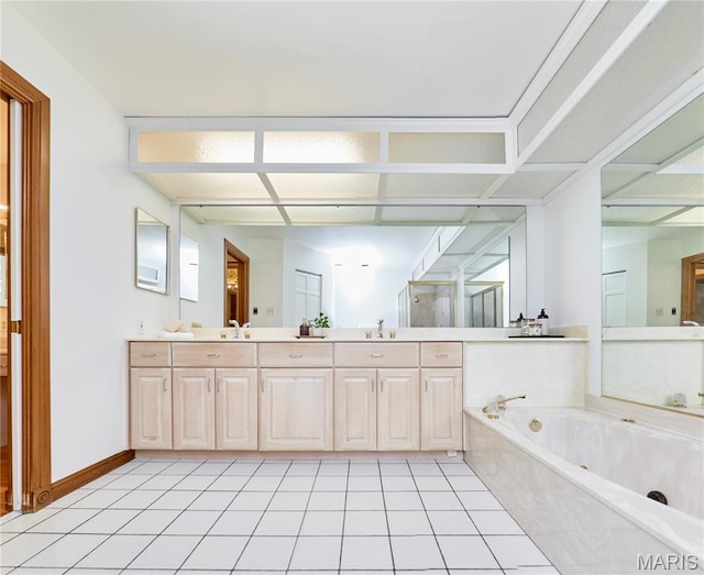 14424 Valley Meadow Ct W, Chesterfield, MO 63017 - bathroom with double vanity, a jetted tub, and tile patterned floors