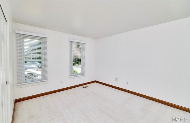 14424 Valley Meadow Ct W, Chesterfield, MO 63017 - carpeted spare room with baseboards