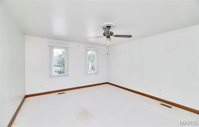 14424 Valley Meadow Ct W, Chesterfield, MO 63017 - carpeted spare room with baseboards and ceiling fan