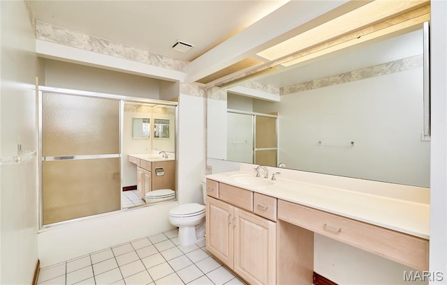 14424 Valley Meadow Ct W, Chesterfield, MO 63017 - full bath featuring tile patterned flooring, vanity, and shower / bath combination with glass door
