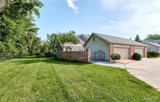 14424 Valley Meadow Ct W, Chesterfield, MO 63017 - view of home's exterior with driveway, an attached garage, and brick siding