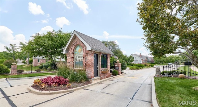 14424 Valley Meadow Ct W, Chesterfield, MO 63017 - view of home's exterior featuring brick siding and a shingled roof