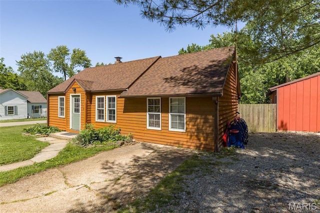 1158 Mulberry St, Bismarck, MO 63624 - view of front of home with a shingled roof and driveway