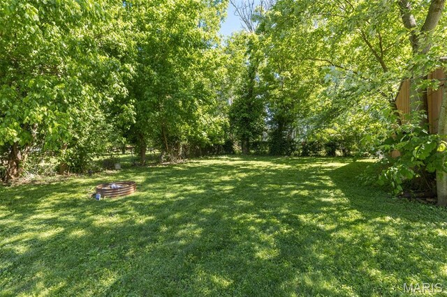 1158 Mulberry St, Bismarck, MO 63624 - view of yard featuring an outdoor fire pit