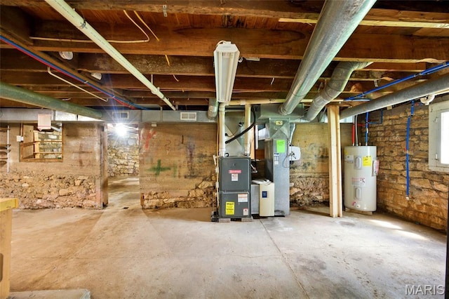 402 N 11th St, De Soto, MO 63020 - basement with electric water heater