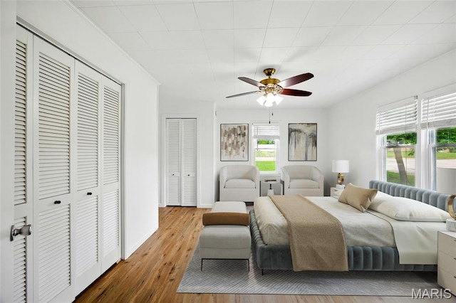 402 N 11th St, De Soto, MO 63020 - bedroom featuring wood finished floors, ceiling fan, and baseboards