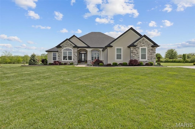 2 Mahogany Run, Farmington, MO 63640 - french country style house with stone siding and a front yard