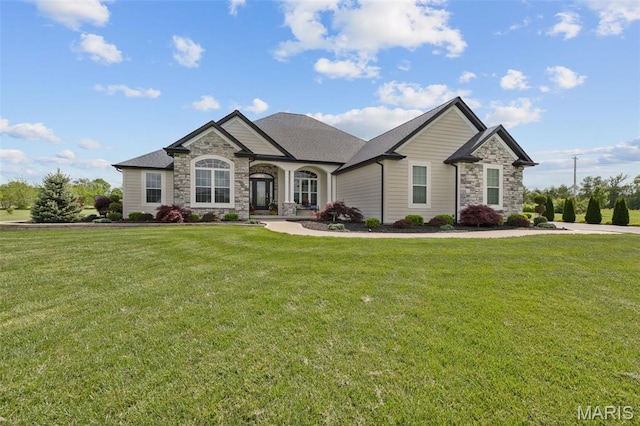 2 Mahogany Run, Farmington, MO 63640 - french provincial home with stone siding and a front lawn