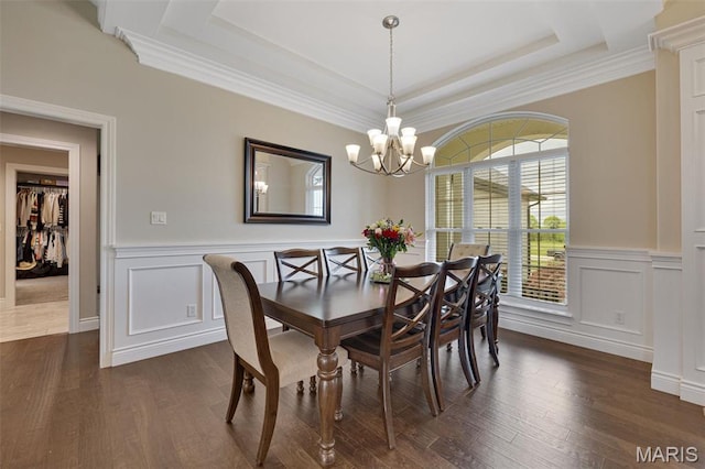 2 Mahogany Run, Farmington, MO 63640 - dining room featuring a chandelier, a tray ceiling, dark wood-style flooring, a wainscoted wall, and crown molding