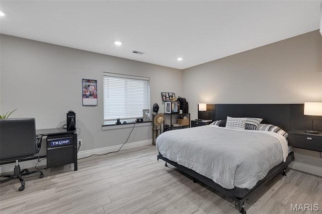 2 Mahogany Run, Farmington, MO 63640 - bedroom with baseboards, wood finished floors, an office area, and recessed lighting