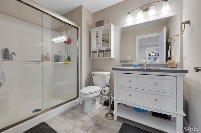 2 Mahogany Run, Farmington, MO 63640 - bathroom featuring toilet, a shower stall, vanity, marble look tiles, and baseboards