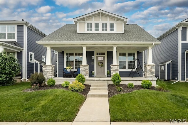17006 Main St, Wildwood, MO 63040 - craftsman inspired home featuring a shingled roof, a porch, and a front yard