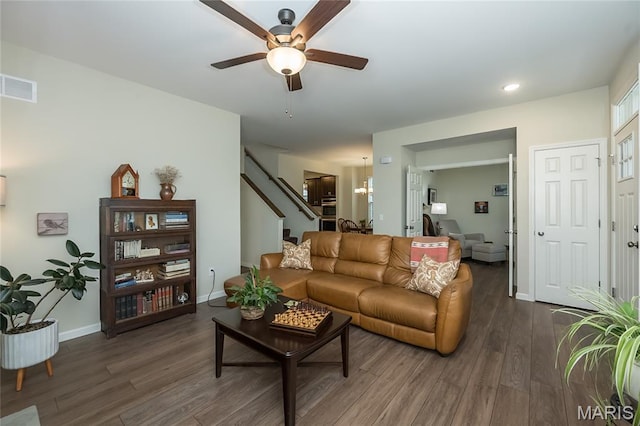 17006 Main St, Wildwood, MO 63040 - living area featuring stairway, a ceiling fan, dark wood-type flooring, baseboards, and recessed lighting
