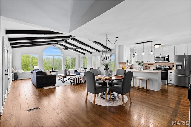 827 Bridgewater Xing, Villa Ridge, MO 63089 - dining room featuring a ceiling fan and dark wood-style flooring