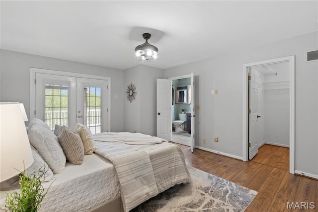827 Bridgewater Xing, Villa Ridge, MO 63089 - bedroom with french doors, access to exterior, wood finished floors, baseboards, and a spacious closet