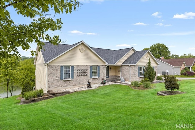 827 Bridgewater Xing, Villa Ridge, MO 63089 - single story home featuring a front lawn, roof with shingles, and brick siding