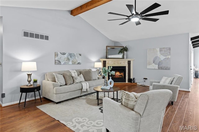 827 Bridgewater Xing, Villa Ridge, MO 63089 - living area featuring ceiling fan, a fireplace, wood finished floors, and baseboards