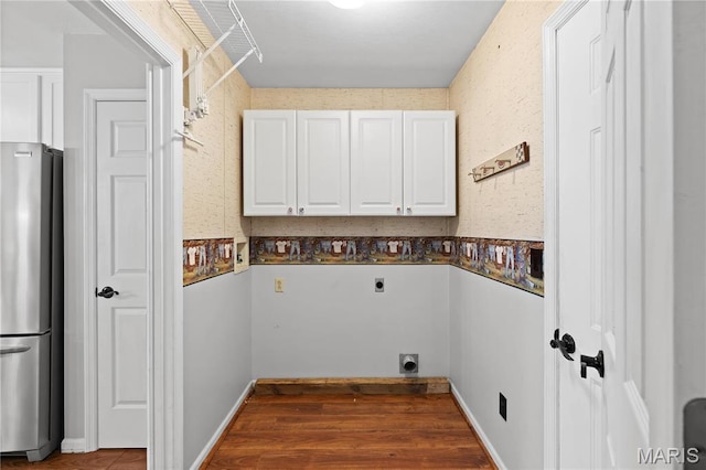 827 Bridgewater Xing, Villa Ridge, MO 63089 - washroom with hookup for an electric dryer, cabinet space, and wood finished floors
