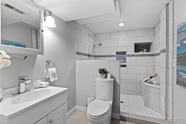 827 Bridgewater Xing, Villa Ridge, MO 63089 - bathroom with walk in shower, toilet, baseboards, vanity, and speckled floor