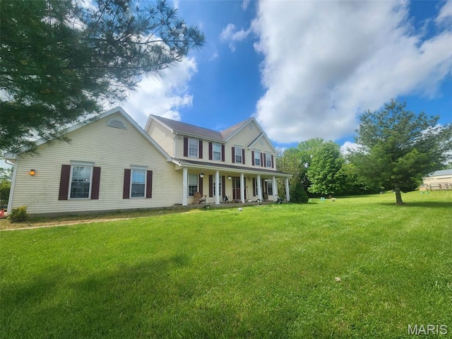 12650 State Highway M, Wright City, MO 63390 - colonial inspired home featuring covered porch and a front yard
