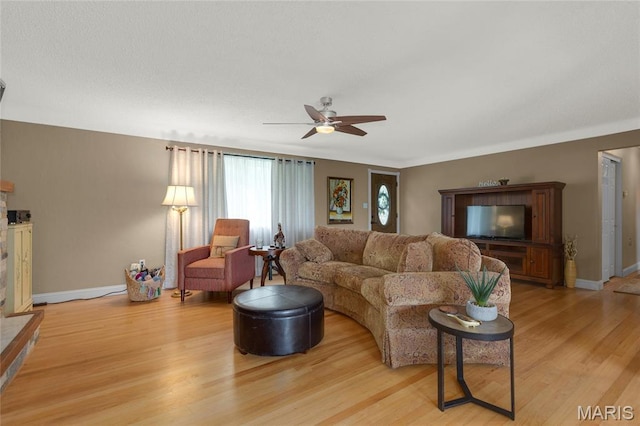 1261 Whispering Winds Dr, Arnold, MO 63010 - living room featuring ceiling fan and light wood-style floors