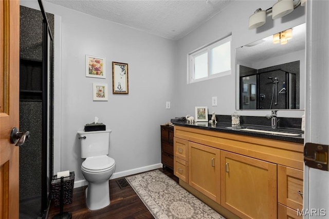 1261 Whispering Winds Dr, Arnold, MO 63010 - full bath featuring vanity, a stall shower, wood finished floors, and a textured ceiling