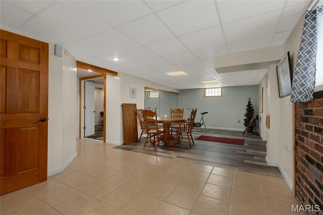 1261 Whispering Winds Dr, Arnold, MO 63010 - dining room featuring a paneled ceiling and light tile patterned floors