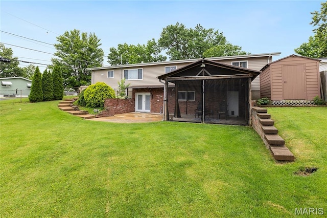 1261 Whispering Winds Dr, Arnold, MO 63010 - back of property featuring a sunroom, a storage shed, a patio, and brick siding