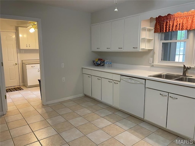 408 Crestview St, Cuba, MO 65453 - kitchen with white dishwasher, a sink, light tile patterned flooring, and light countertops