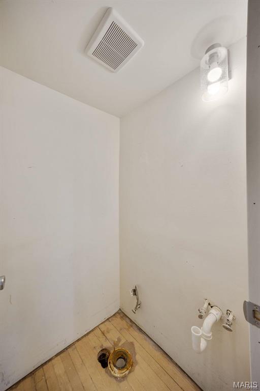 empty room with light wood finished floors