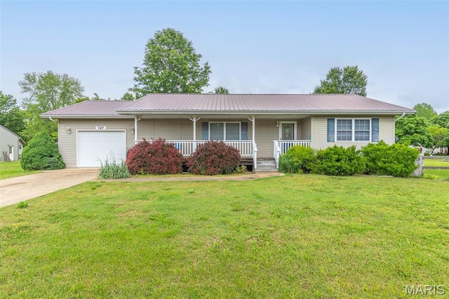 127 Chippewa, Piedmont, MO 63957 - single story home with a garage, covered porch, driveway, and a front yard