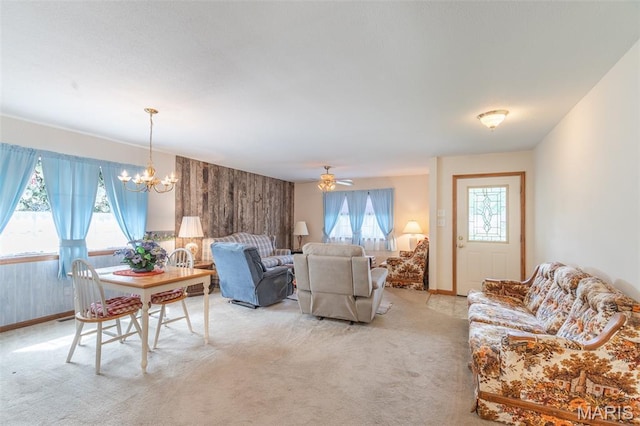 127 Chippewa, Piedmont, MO 63957 - living area featuring a chandelier, light colored carpet, and baseboards