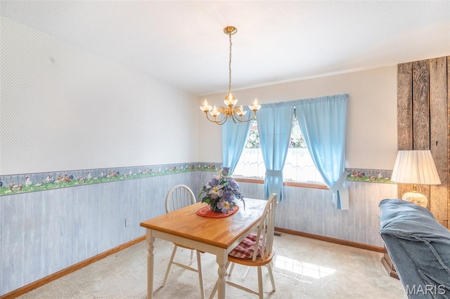 127 Chippewa, Piedmont, MO 63957 - carpeted dining room with a chandelier, wallpapered walls, baseboards, wainscoting, and wood walls