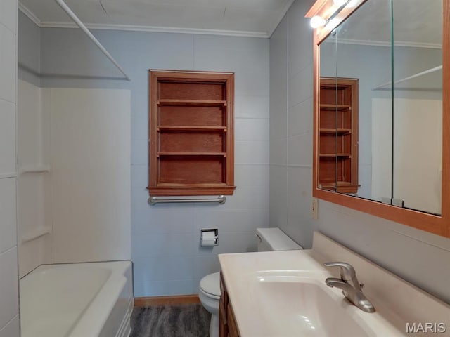 full bath featuring crown molding, toilet, vanity, and shower / bath combination