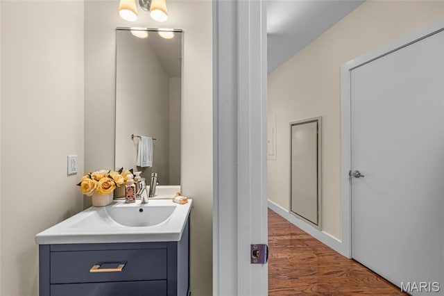 9 N Euclid Ave Unit 303, Saint Louis, MO 63108 - bathroom with vanity and wood finished floors