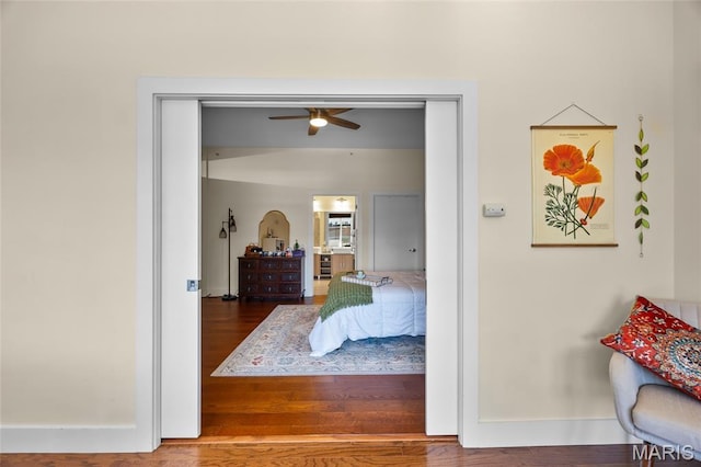 9 N Euclid Ave Unit 303, Saint Louis, MO 63108 - bedroom with wood finished floors, baseboards, and ceiling fan