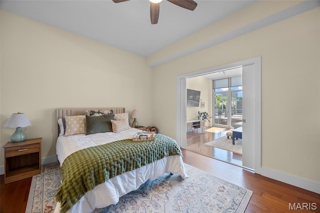 9 N Euclid Ave Unit 303, Saint Louis, MO 63108 - bedroom with wood finished floors, baseboards, and ceiling fan